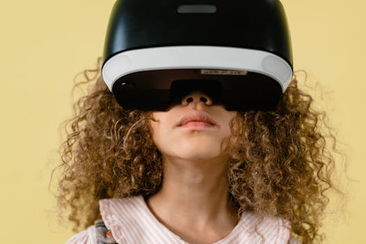 Curly-haired child with VR headset exploring virtual world indoors.